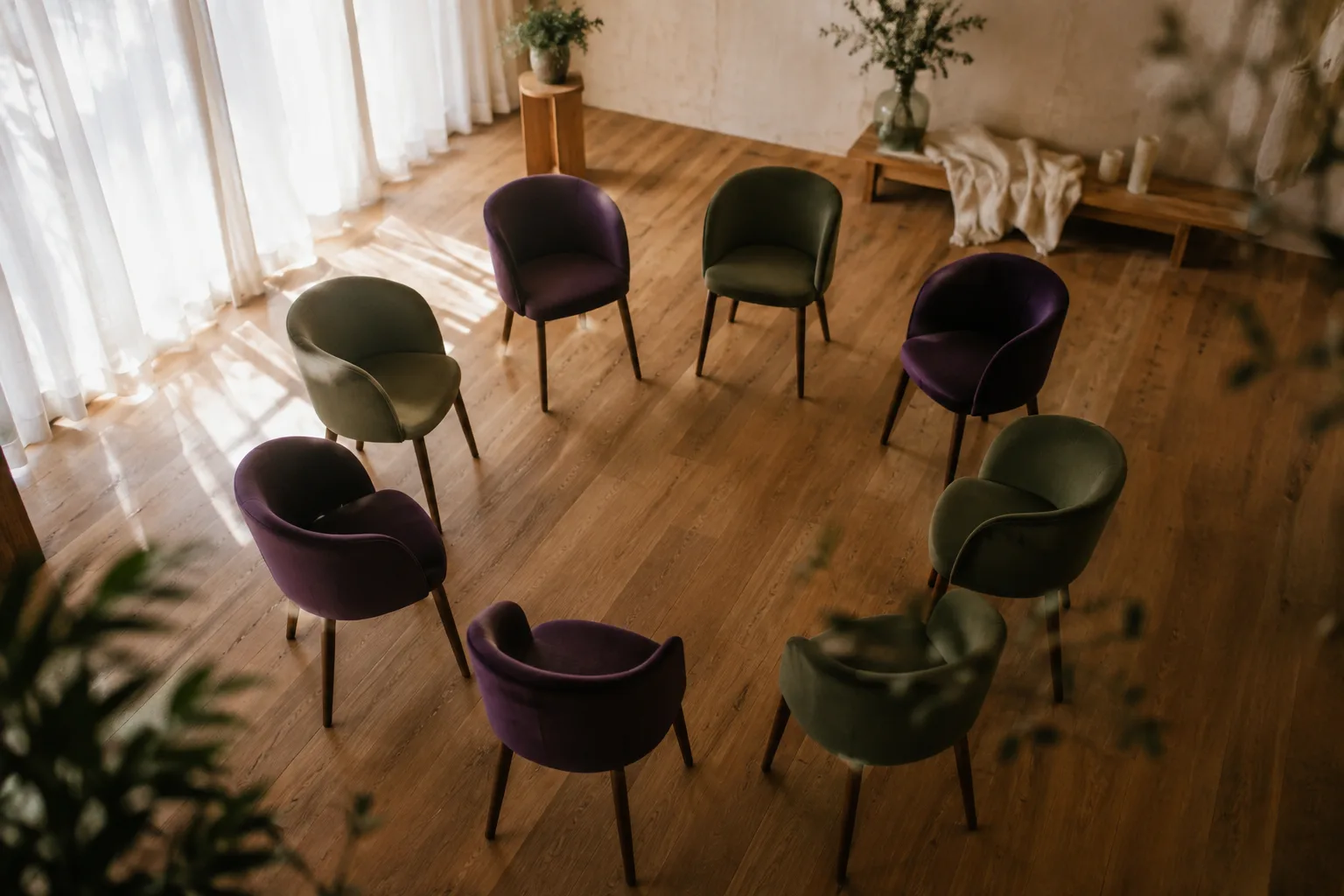 A room of participants during a Collective Love Coaching group session